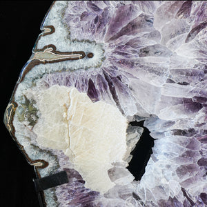 AMETHYST SLICE WITH CALCITE ON ROTATING BASE
